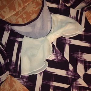 White and purple dress with bow on back